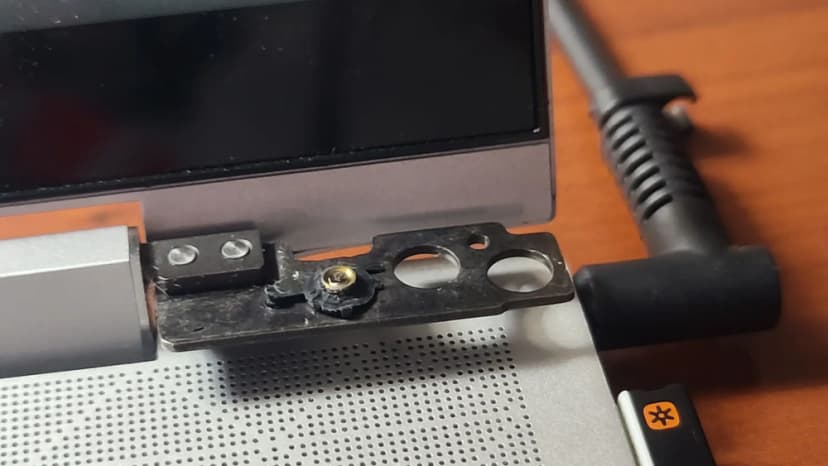Damaged hinge pushed out of front screen on HP x360 laptop Damaged hinge pushed out of front screen on HP x360 laptop